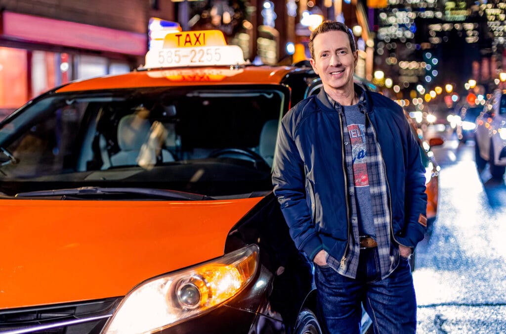 Adam Growe, Host of Cash Cab, Beside the Cab