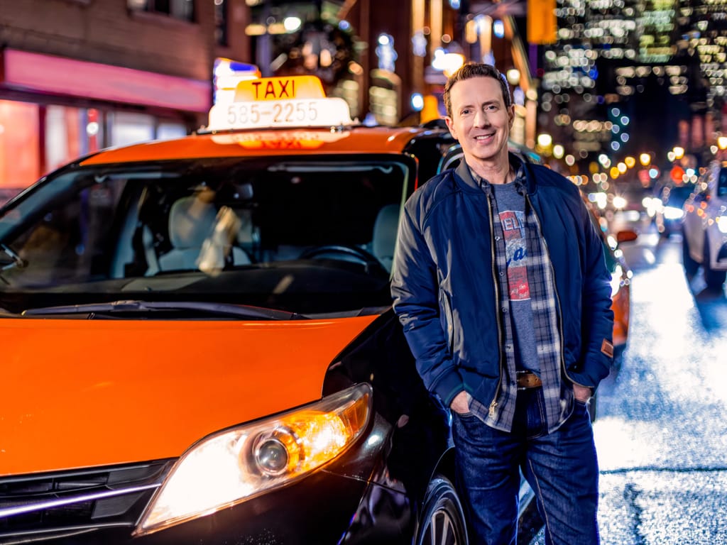 Adam Growe, Host of Cash Cab, Beside the Cab